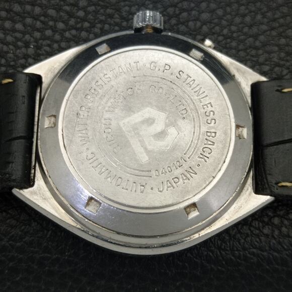 Vintage 1978 Ricoh Automatic Mens Silver Watch W/daydate & Red accents - Picture 8 of 10